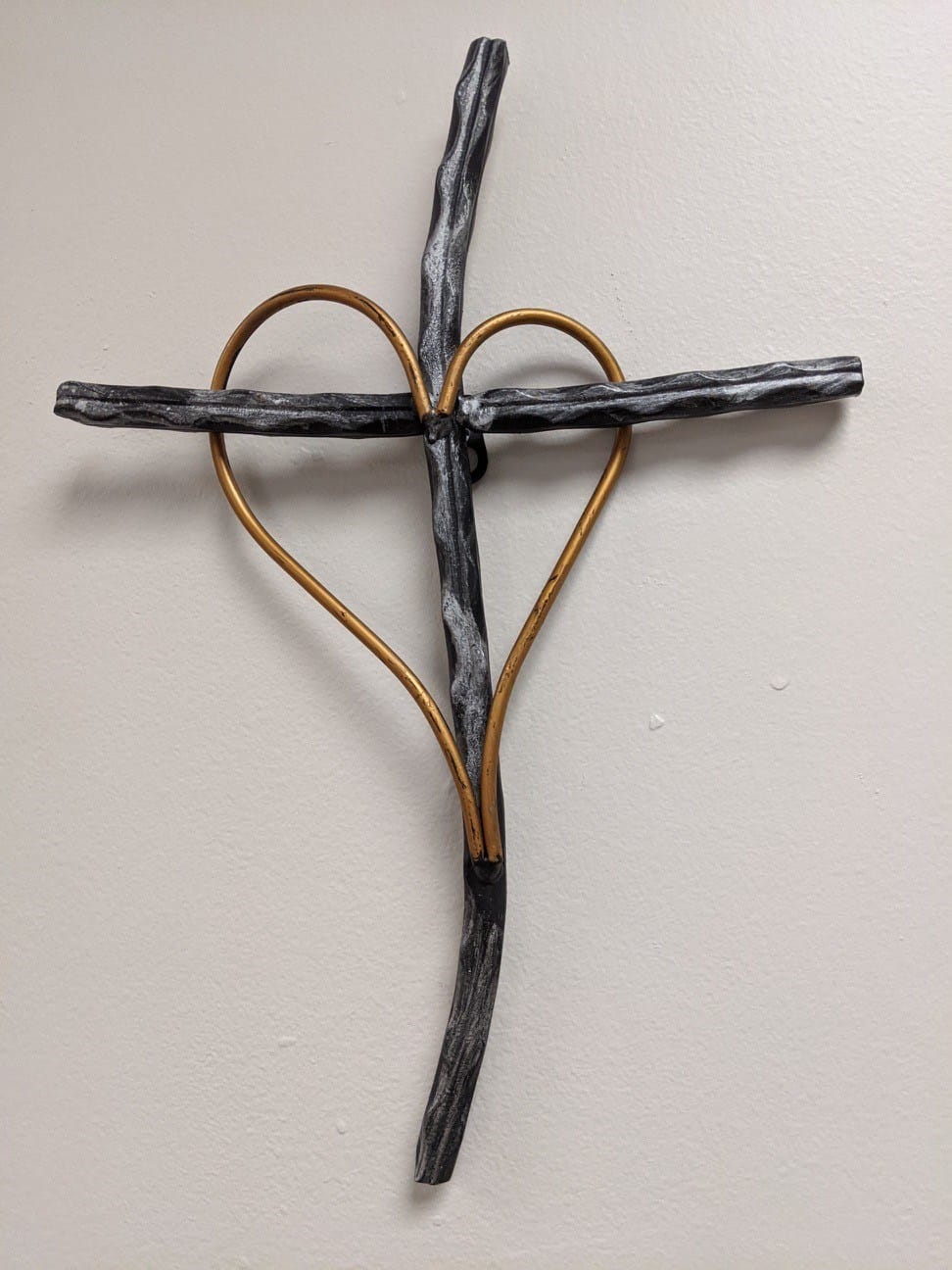 graphic of cross with a heart